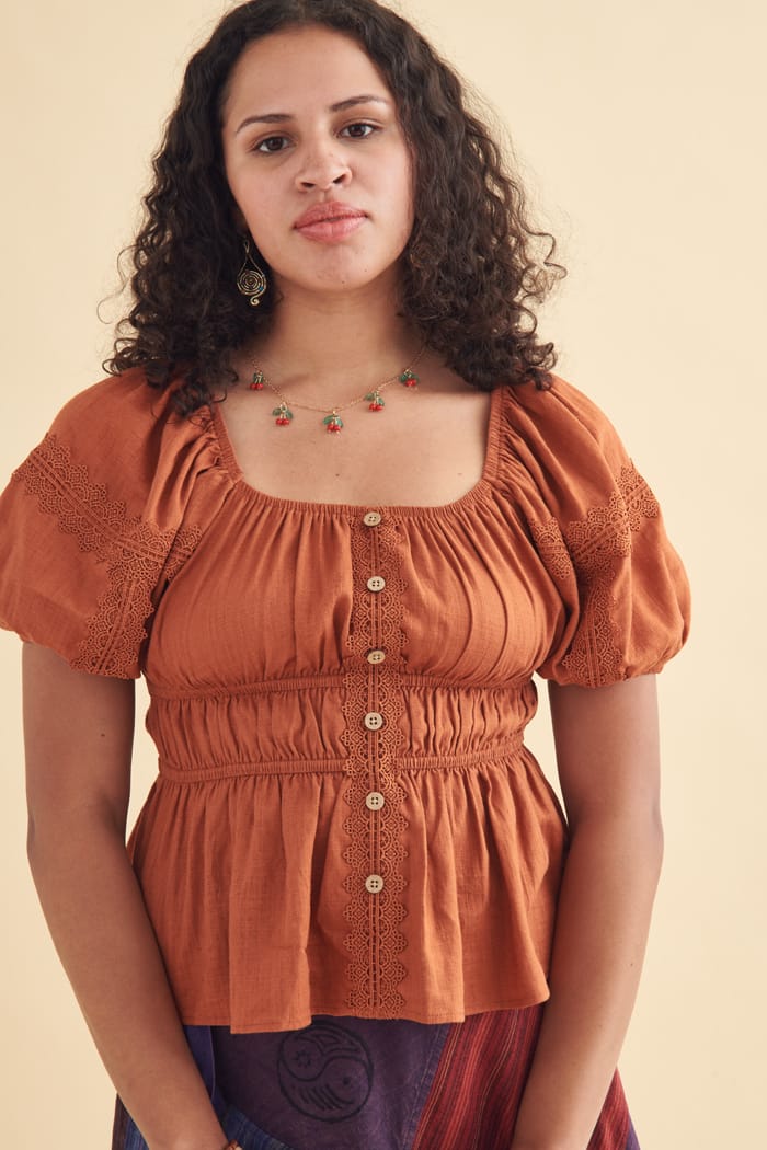 Burnt orange peplum top discount
